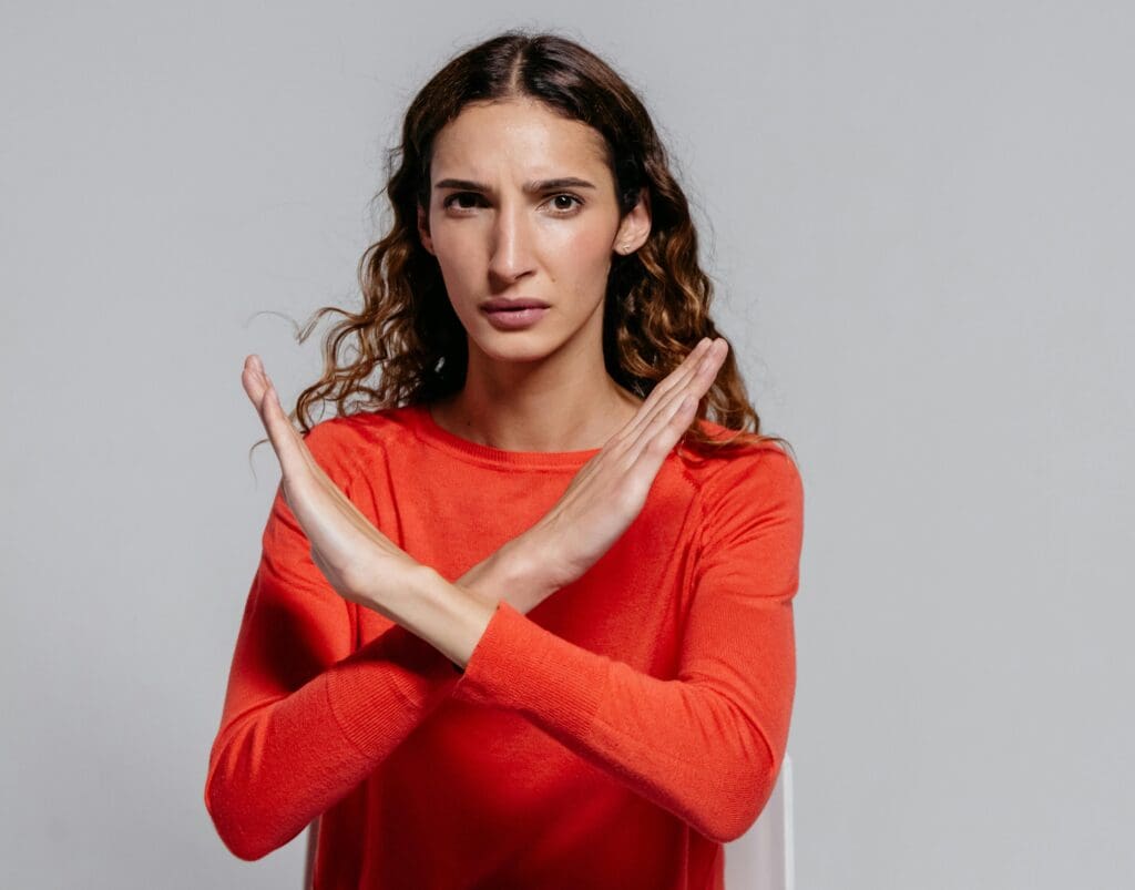 Woman making a stop gesture.